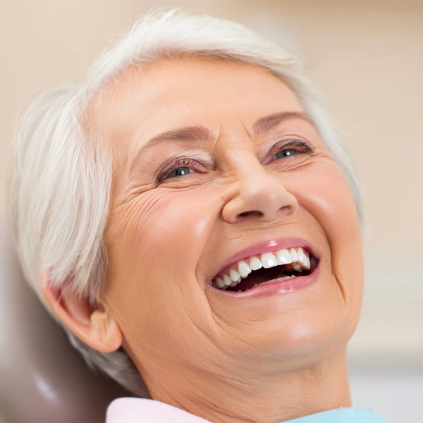 All-on-4 Dental Implants - patient is satisfied with procedure performed at the Arlington Dentist
